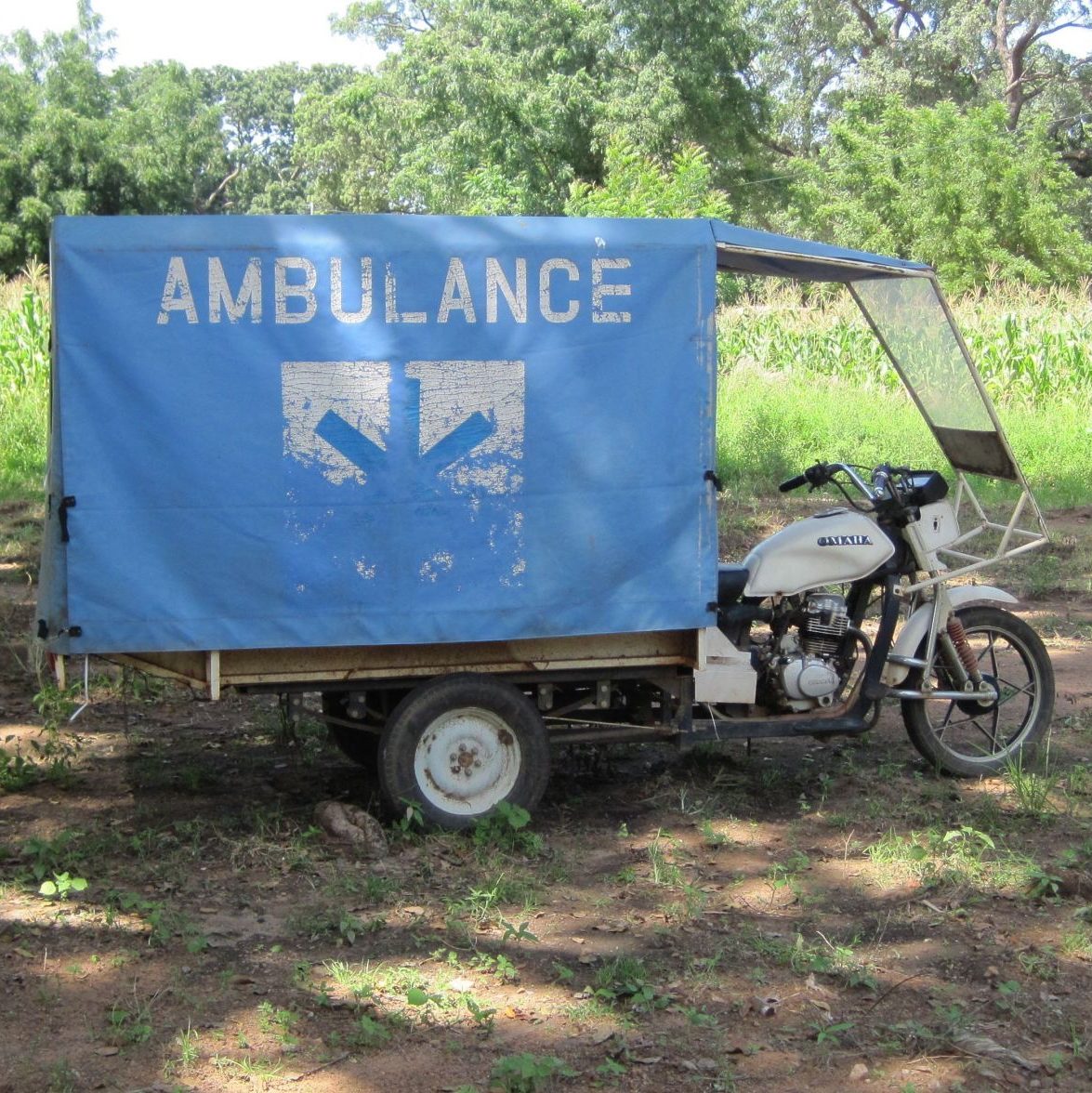 Motor cycle ambulance used to transport patients in rural Burkina Faso